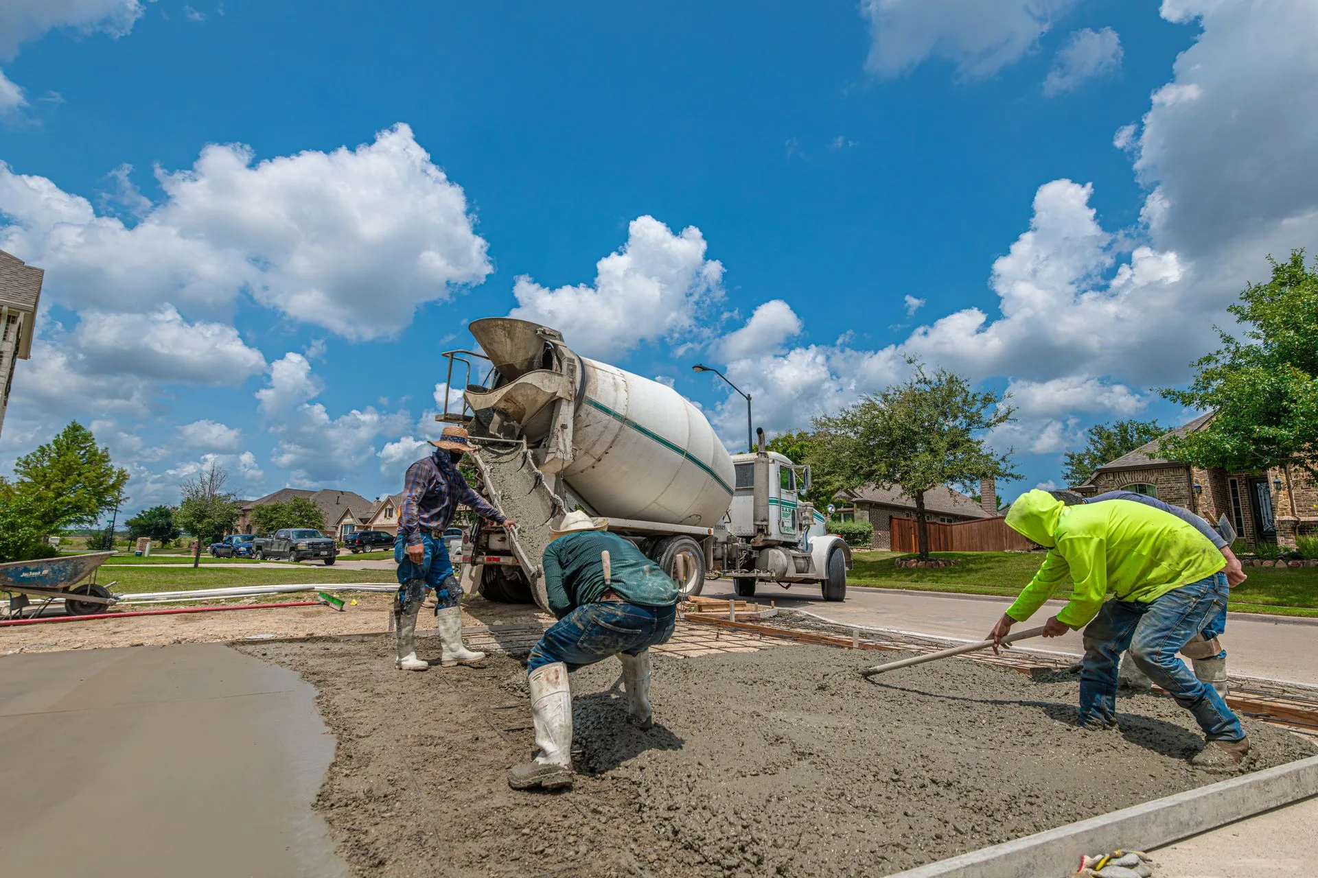 Concrete crew laying a residential driveway